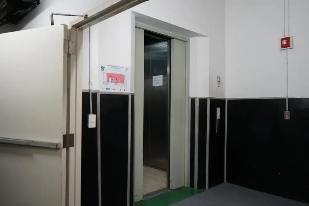 Damaged ceiling in the service lift