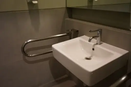 [CASE000106] Leaking water faucet at the disability restroom sink